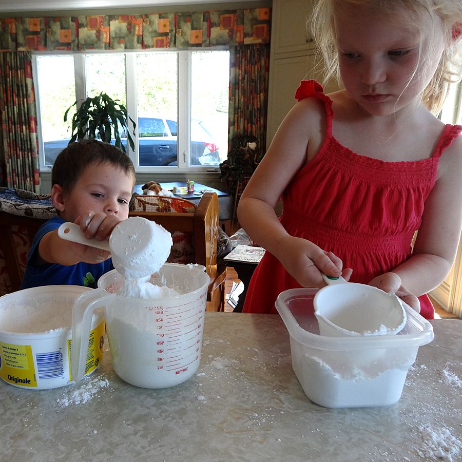 Addison and Jamie measuring icing sugar