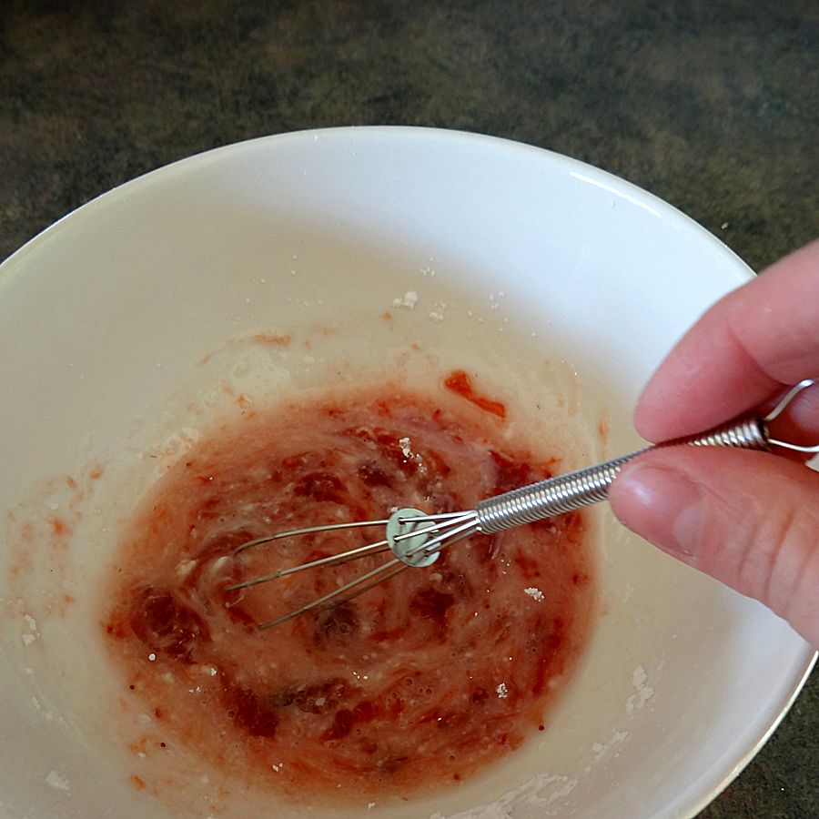 whisking glaze with seriously the tiniest whisk ever